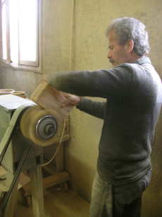 Kosta shapes the chopping boards